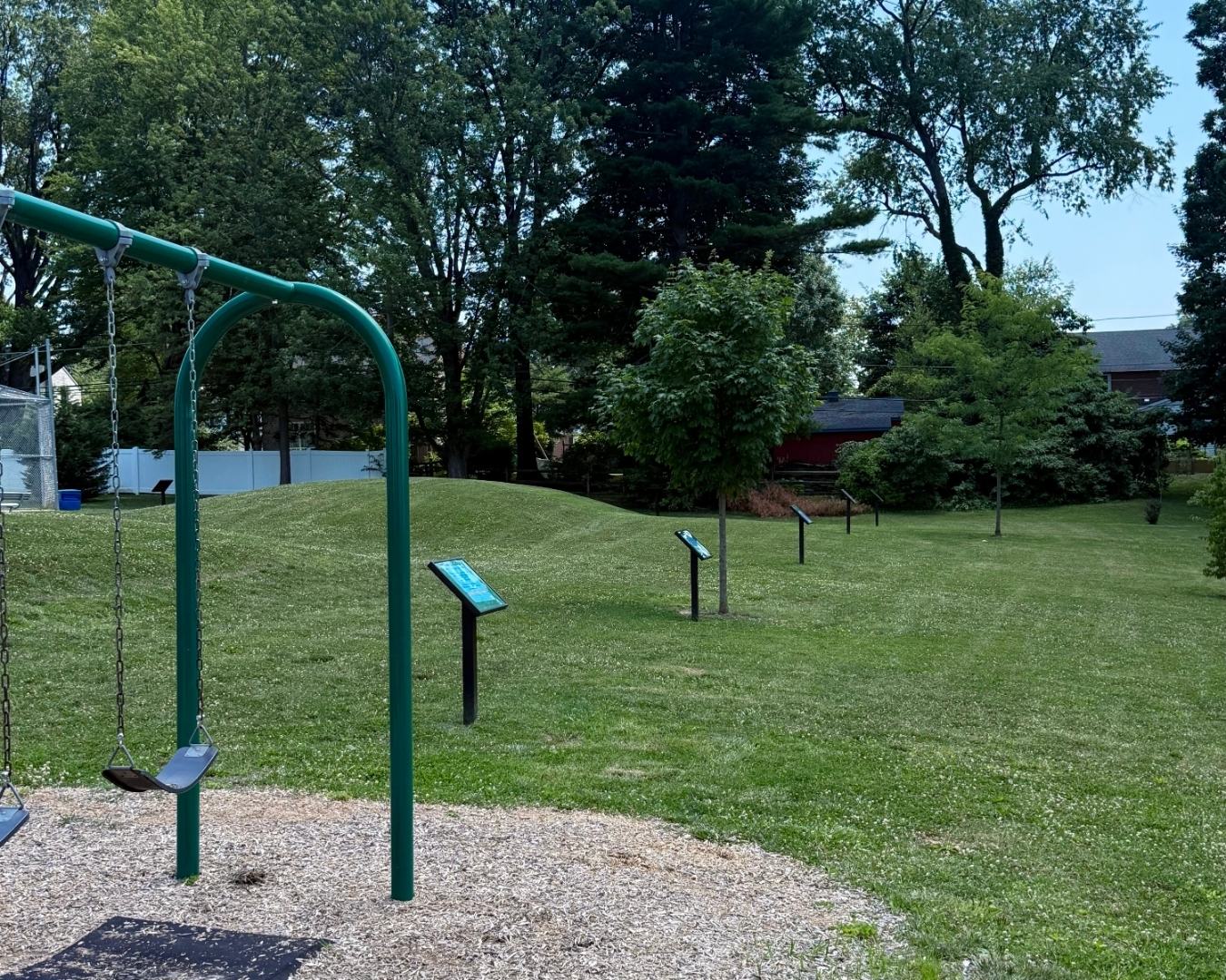 Last half of StoryWalk at the playground